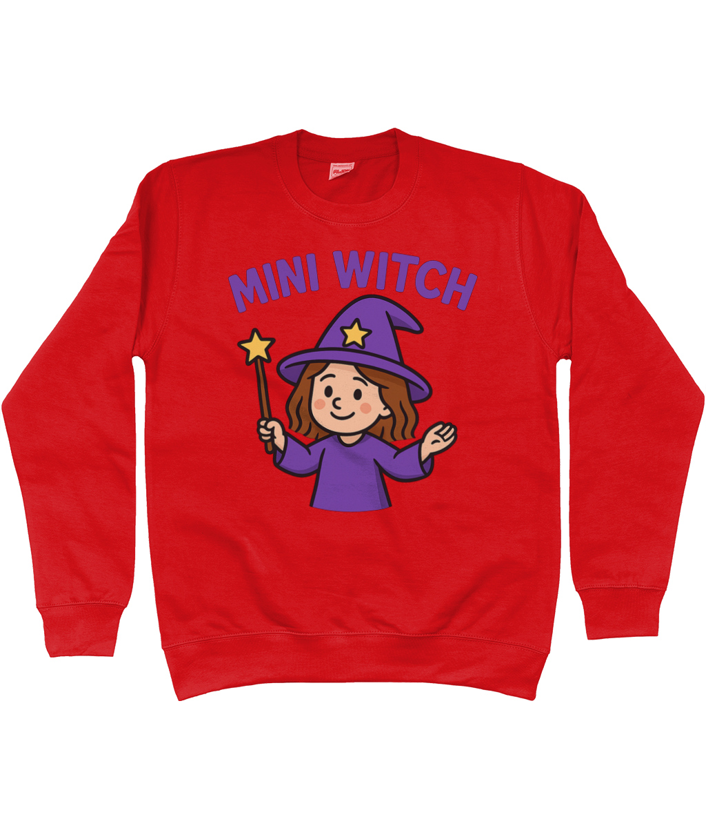 Red sweatshirt displaying text "MINI WITCH" above a smiling girl in a purple witch hat waving a star-tipped wand on a plain white background.