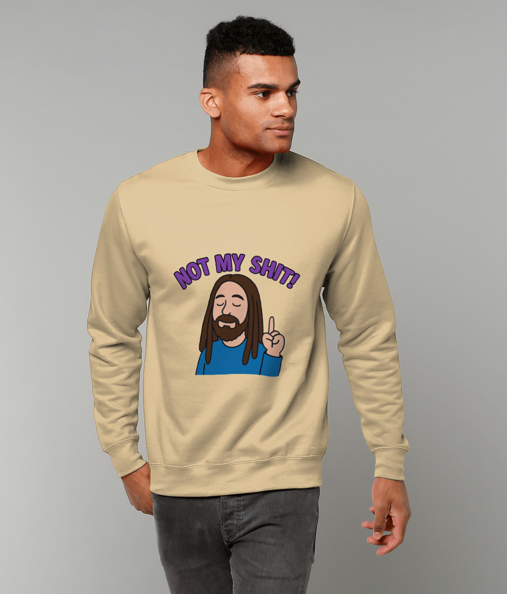 Beige sweatshirt displaying a cartoon bearded person raising one finger with eyes closed and text "NOT MY SHIT!" worn by a man standing against a plain gray studio background.
