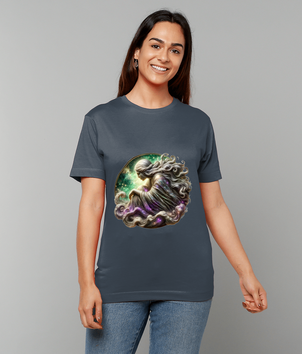 Smiling woman wearing a dark gray T-shirt displaying a curled celestial figure with flowing hair and nebula-like colors within a circular frame, standing against a plain light gray background.