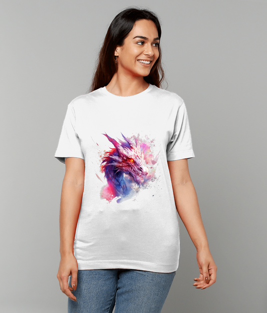 A woman wears a white T-shirt displaying a vibrant watercolor dragon head; she smiles and looks to the right while standing against a plain light gray background.