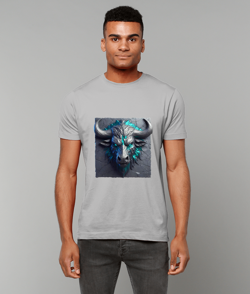Bull head graphic printed on a man's light gray T-shirt, centered on his chest, horned stone face with glowing cyan-blue highlights, he stands in front of a plain gray background.