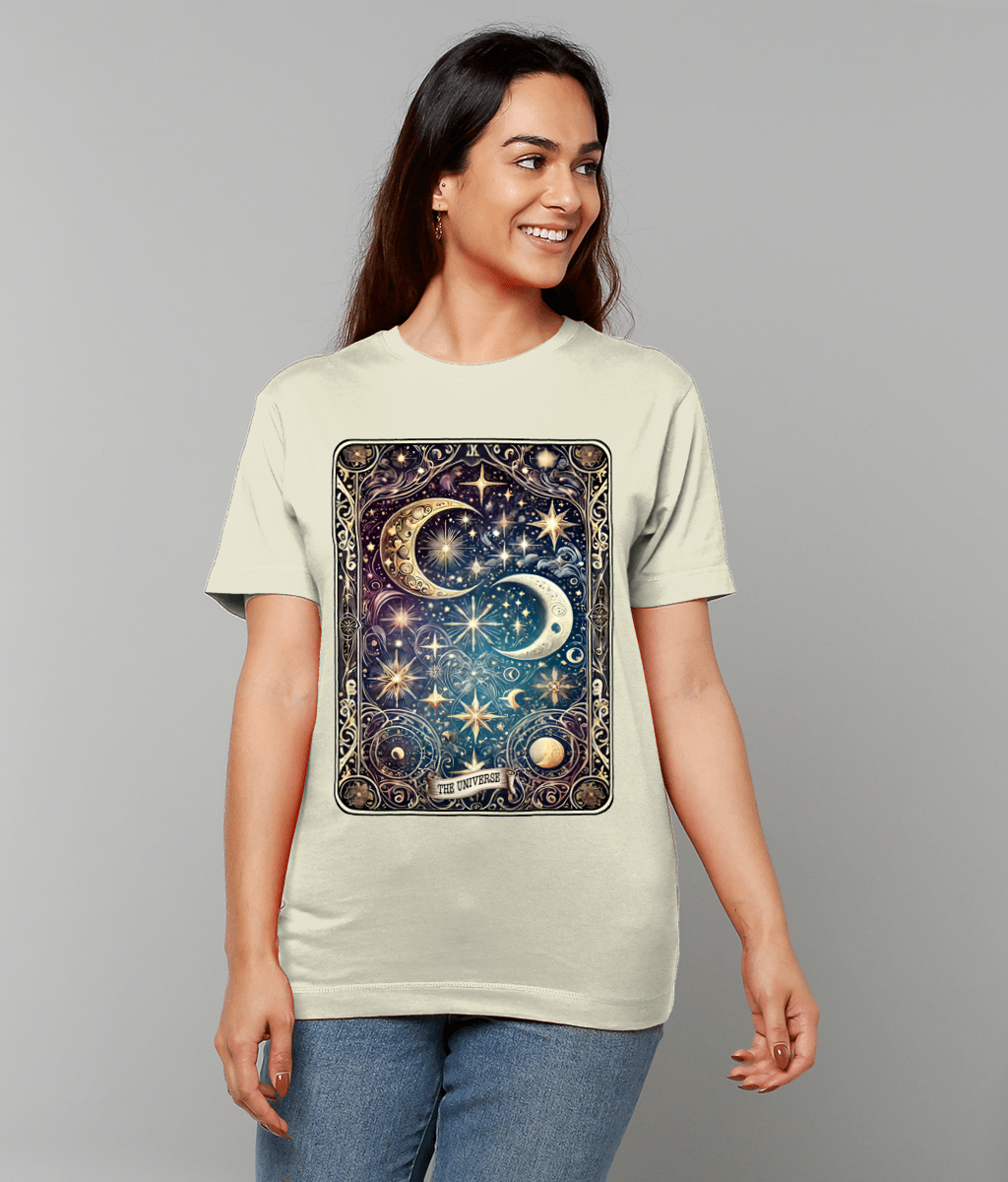 T-shirt panel shows ornate twin crescent moons, stars, planets and swirling filigree labeled THE UNIVERSE, worn by a smiling woman against a plain gray background.