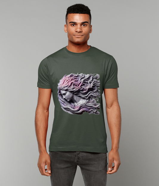 Stone-like female head with flowing pink and purple hair facing downward printed on an olive green T-shirt worn by a standing young man against a plain light gray background.