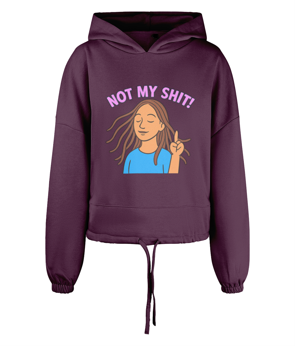 Maroon cropped hoodie displays illustrated woman with closed eyes and raised index finger, text reading "NOT MY SHIT!" above her, graphic centered on front against a black background.
