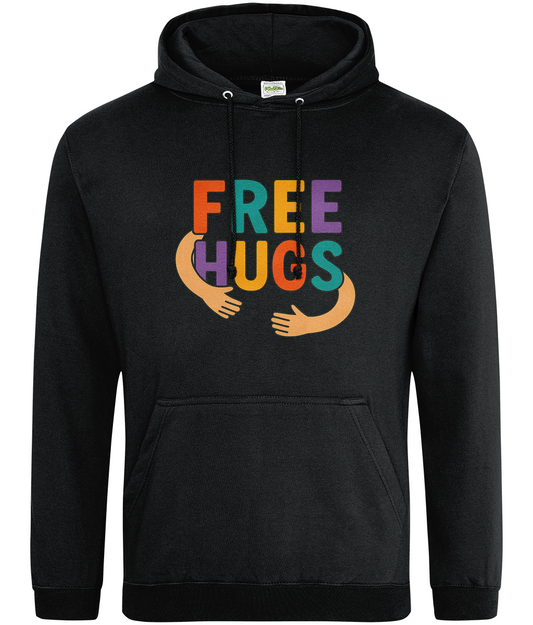 Black hoodie displays "FREE HUGS" in colorful block letters with cartoon arms hugging beneath, shown centered on a plain white background.