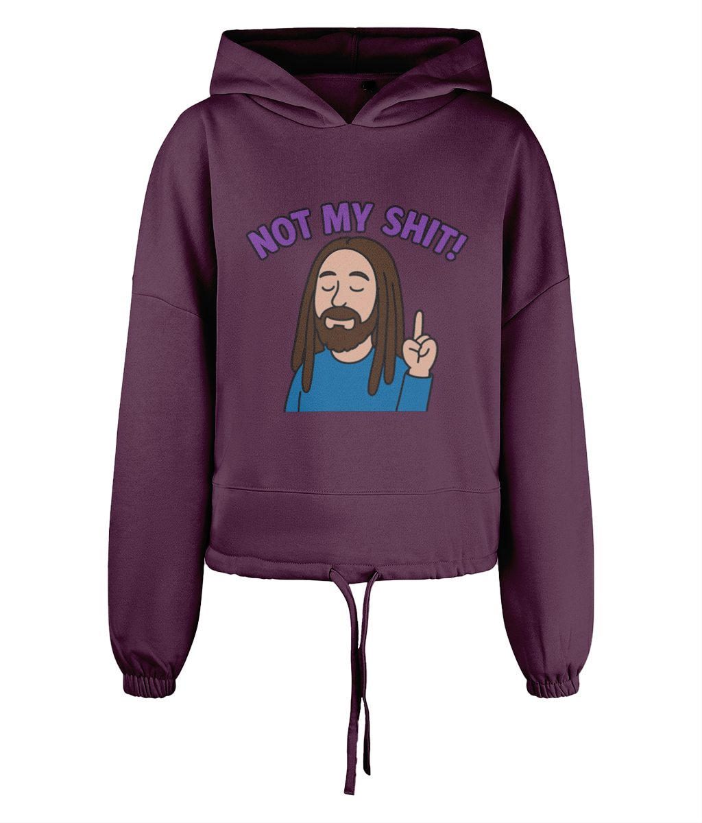 Purple cropped hoodie displays cartoon bearded man with closed eyes raising one finger and bold text 'NOT MY SHIT!' centered on the chest against a plain black background.