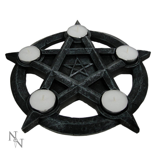 Pentagram-shaped dark stone candle holder holding five white tealight candles at each star point, resting on a plain white background; small logo reads "N N" with a dagger-like symbol.