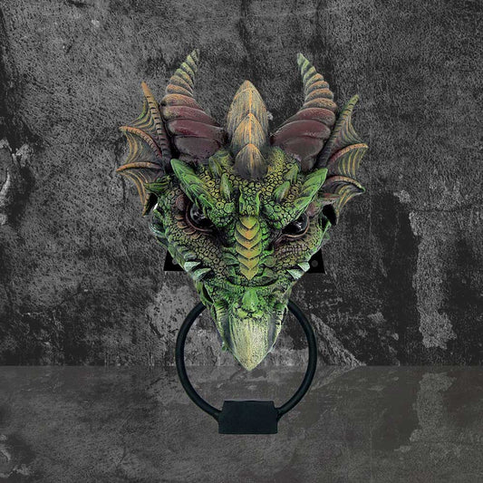A dragon-head door knocker, serving as a doorbell, is mounted on a dark gray wall.
