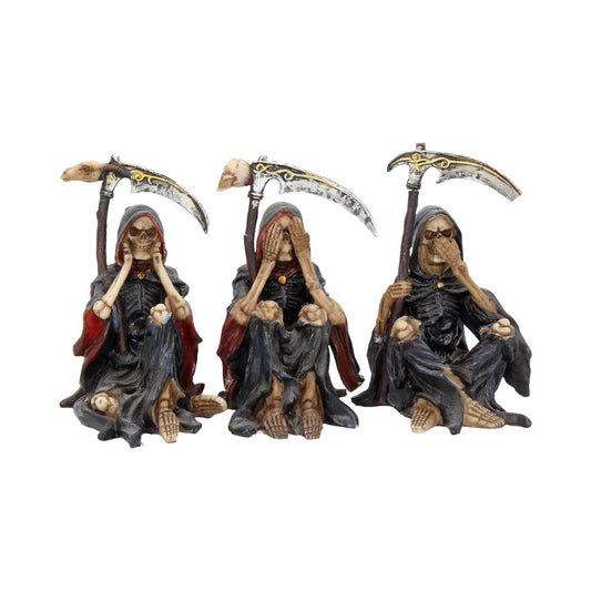 Three grim reaper skeleton figurines sit holding scythes while covering ears, eyes, and mouth respectively against a white background.