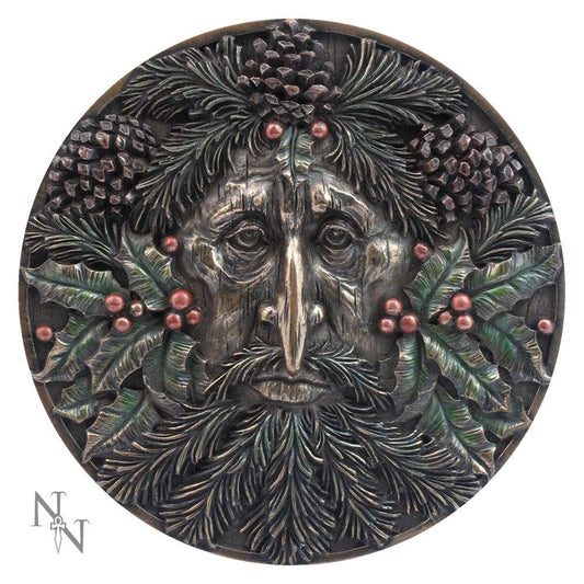 Round Winter Green Man plaque with evergreen foliage, pine cones and red berries