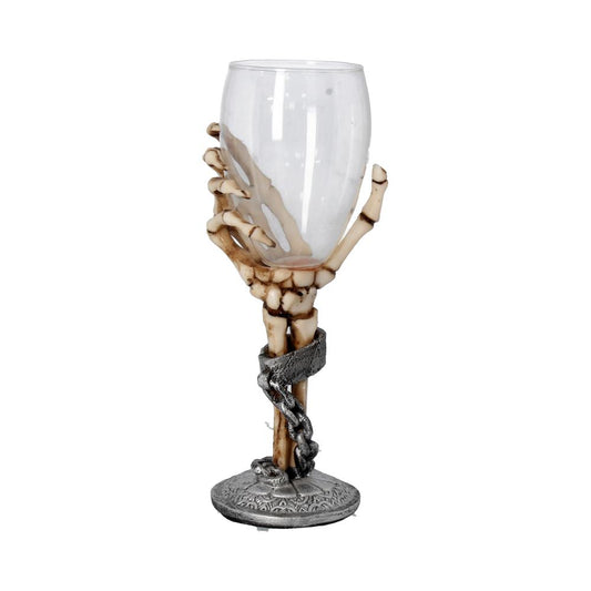 A wine glass is being held by a skeleton hand attached to a metallic base, which is on a white background.