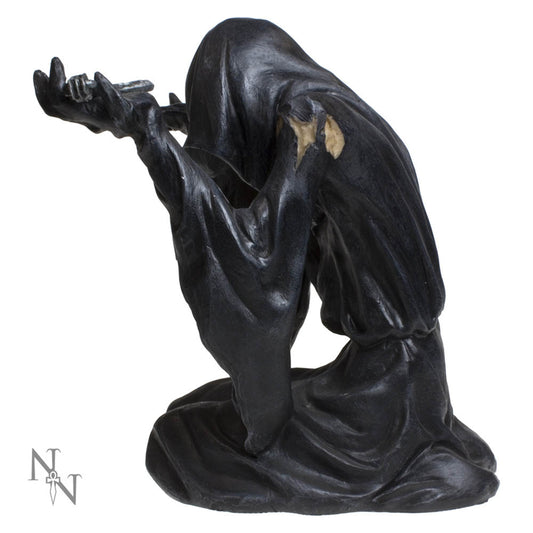 A black-robed figure kneels, offering a small object in outstretched hands, against a white background.