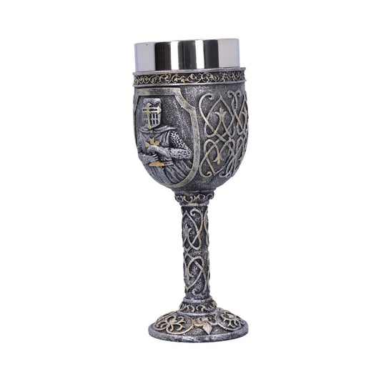 A medieval-themed goblet features an embossed knight, Celtic knotwork and silvery top and a similarly-designed stem, and ornate base, all in front of a plain white background.