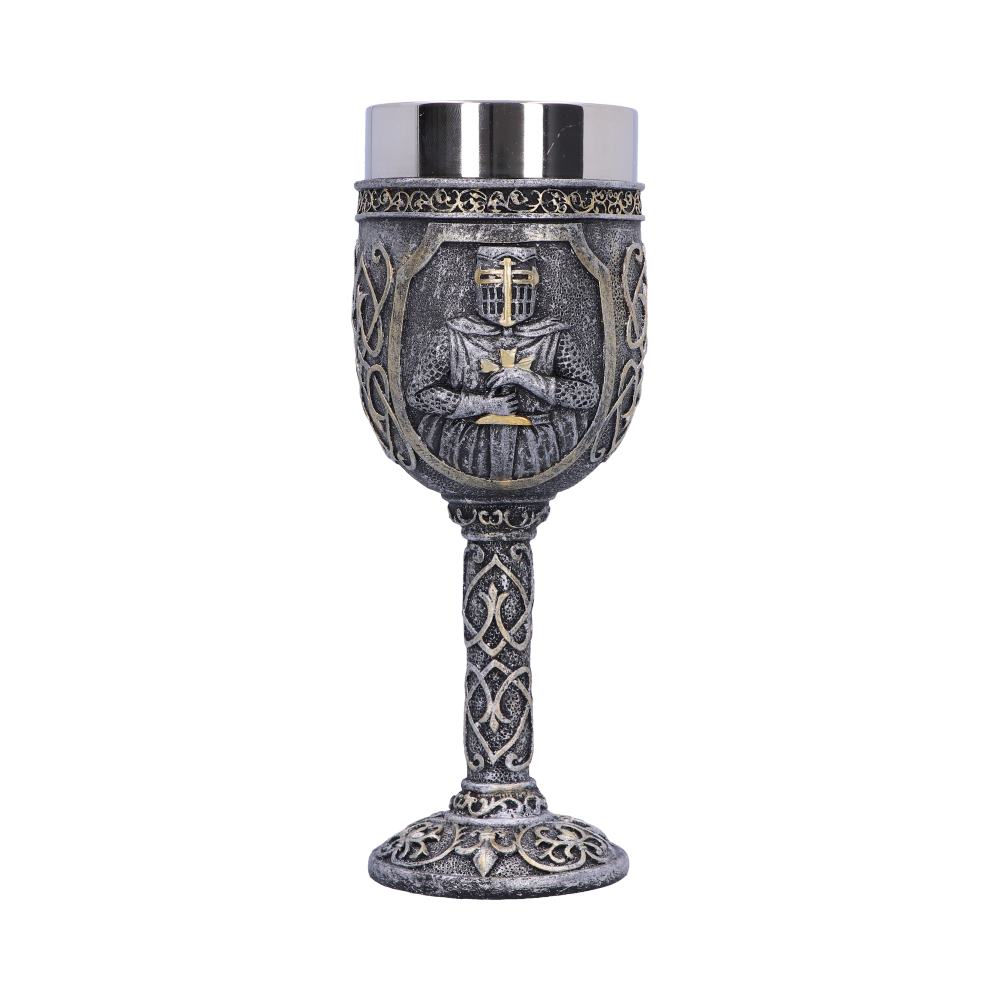 A silver goblet shows a knight clasping a gold cross in an embossed oval, all over an ornately decorated stem and base. It is against a white background.