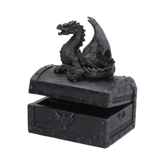 A black decorative chest with a dragon sculpture on top, sits partially open. The chest is adorned with intricate embossed designs and a dragon emblem in an ornate setting.