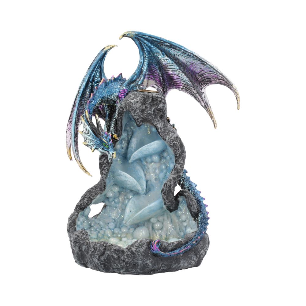 A blue dragon figurine perches atop a sculpted rock, its wings spread; light blue accents suggest a cave or waterfall within the rock.