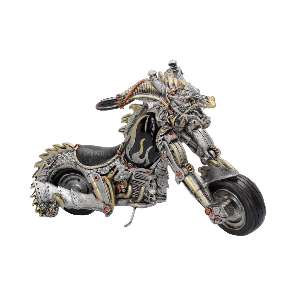 An intricately detailed motorcycle sculpture resembles a metallic dragon, featuring scales, spikes, and flame motifs. It sits motionless, isolated on a plain white background, emphasizing its ornate design.