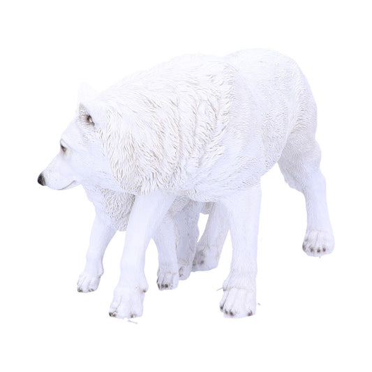 A white wolf figurine stands still, looking to the left. Its fur is intricately detailed. The background is a plain white, emphasizing the wolf's features.
