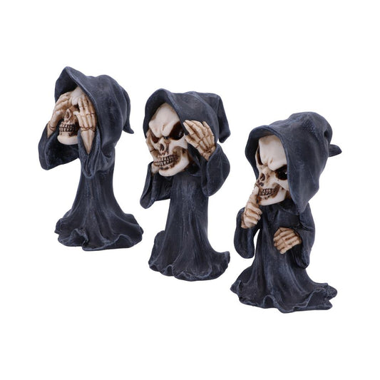Three hooded skull figurines: one covers its eyes, another covers its ears, and the last one covers its mouth. They symbolize "see no evil, hear no evil, speak no evil."