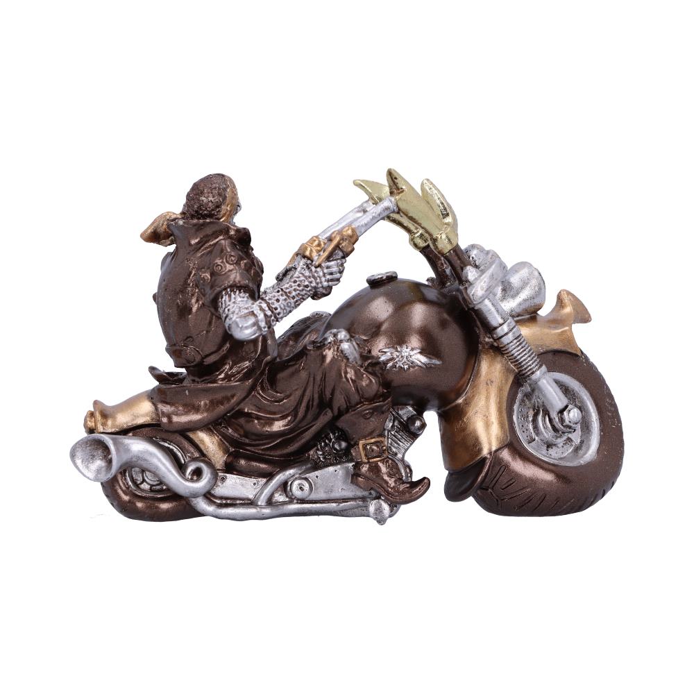 A detailed figurine depicts a robed rider astride a metallic motorcycle, gripping the handlebars. The dynamic pose suggests forward motion, with silver and bronze tones enhancing the sculpture's intricate design.