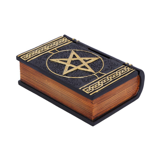 A black book with ornate gold detailing, featuring a prominent pentagram on the cover. It rests closed on a plain, white background. Pages have a rustic, aged appearance.
