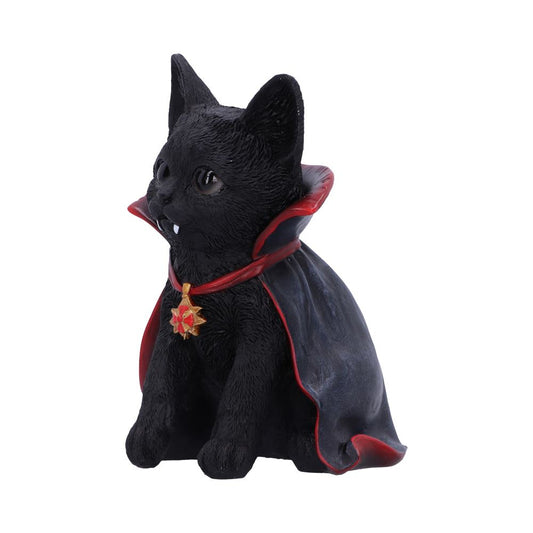 A black cat figurine wears a vampire costume, featuring a red-lined cape and medallion, seated against a plain white background.