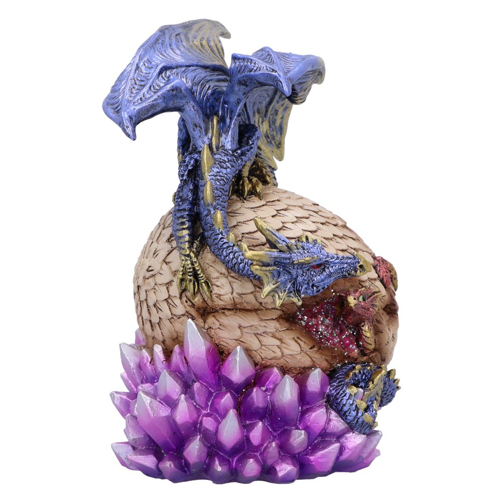 A blue dragon rests atop a textured egg, surrounded by vibrant purple crystals. The dragon's wings are spread, and its tail wraps around the egg.