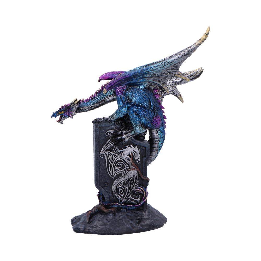 A detailed blue and purple dragon figurine perches on a stone pedestal, adorned with intricate carvings of dragons, set against a plain white background.