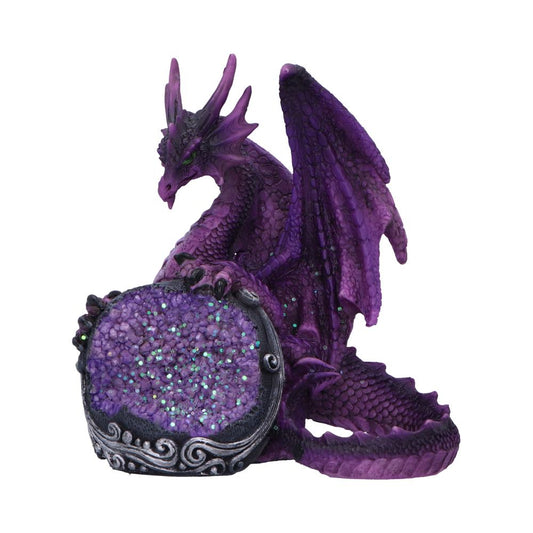 A purple dragon holds a glittering, round geode with its front claws. The geode sparkles with various hues, and intricate patterns adorn its border. The background is plain white.