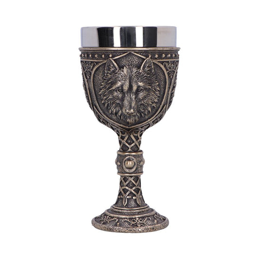 A bronze goblet showcases an ornate wolf head design on its shield-shaped cup. The base and stem feature decorative Celtic knotwork, standing against a plain white backdrop.