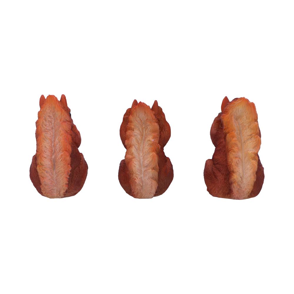 Three identical, stylized squirrel figures sit side-by-side, facing away, with bushy tails featuring a gradient from orange to white, against a plain white background.