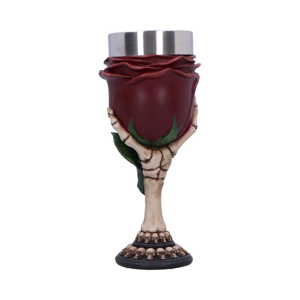 A rose-shaped chalice sits upright. A skeletal hand cradles the bloom-portion, supported by a bone stem, which sits atop a base decorated with tiny skulls.