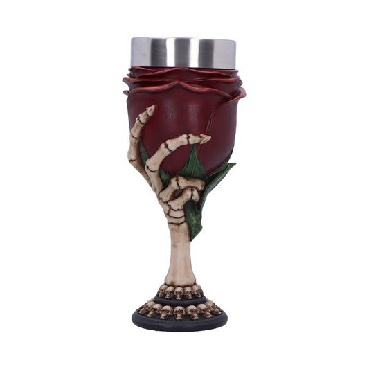A wine glass replicates a red rose with a silver top. A skeletal hand appears to be holding the rose, and a base with miniature skulls adds to the design. The background is plain white.