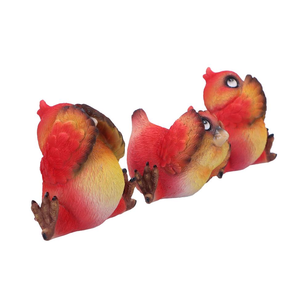 Three colorful, bird figurines in various playful poses, display vibrant red, orange, and yellow hues. They are standing together on a plain white background.
