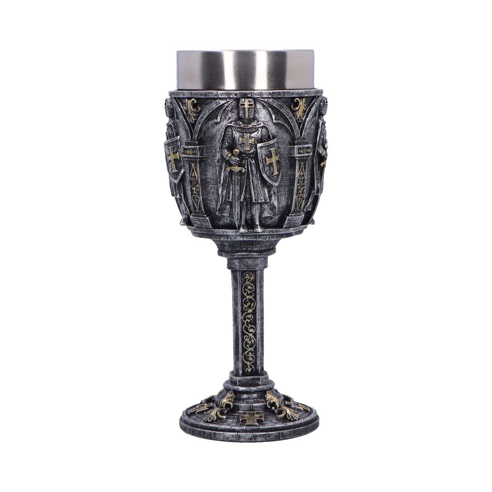 A decorative goblet featuring knight motifs stands upright, showcasing intricate medieval designs. The goblet has a metallic rim and is set against a plain white background.