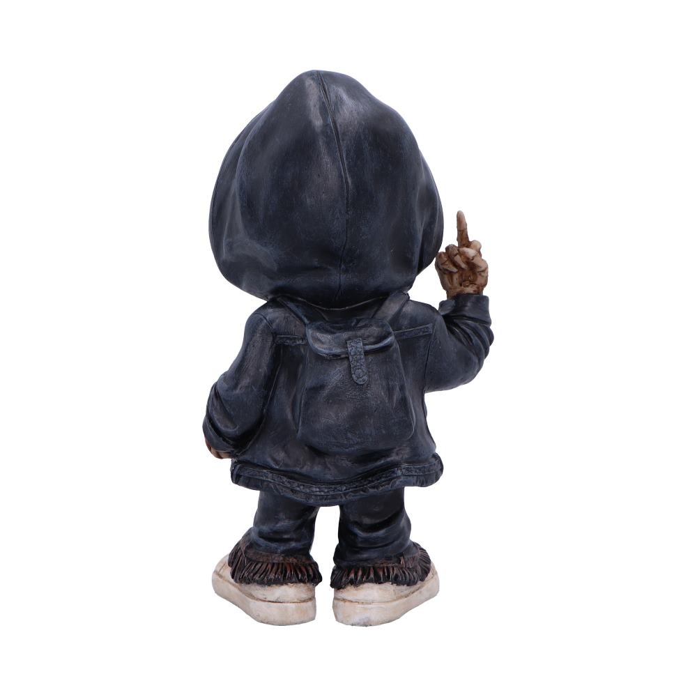 Hooded figurine facing away wears a backpack and dark worn jacket, raises a right index finger while standing on scuffed sneakers against a plain white background.