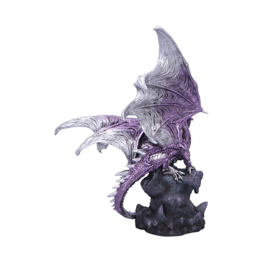 Purple and silver dragon figurine perches on a jagged rock, wings raised and spread, tail curled around the base, textured scales and pronounced wing membranes against a white background.
