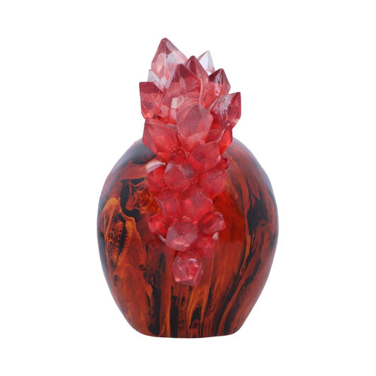 Red translucent crystal cluster rises from a glossy red-and-black marbled egg-shaped base against a plain white background.