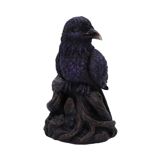 Sculpted purple-black raven figurine perches on a gnarled root base, gazing to its right against a plain white background.
