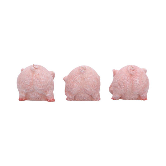 Three small pink pig figurines face away in a row, showing their rear ends against a plain white background.