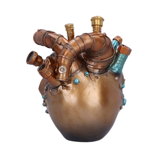 Bronze steampunk heart sculpture displays curved riveted pipes and threaded fittings protruding from its top and sides, combining metallic turquoise accents against a plain white studio background.