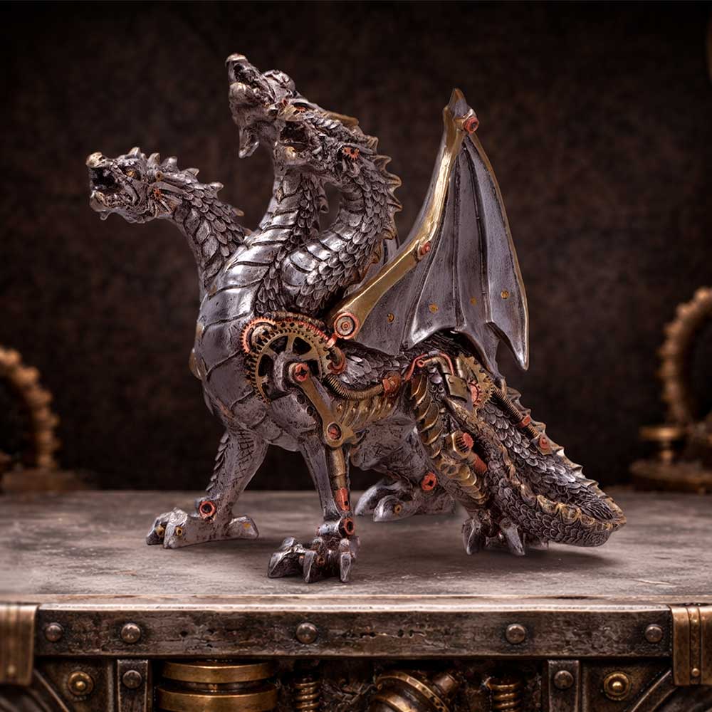 Cogwork Trinity Three-Headed Steampunk Dragon - mechanical dragon displayed in a workshop setting