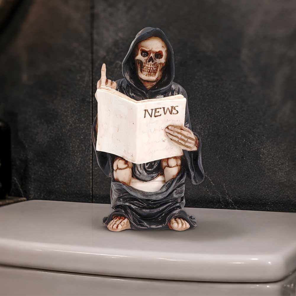 Final Flush Reaper Ornament - cheeky reaper ornament displayed on a bathroom-style surface