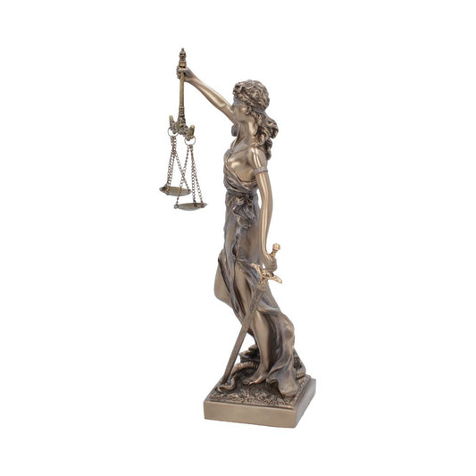 A bronze statue of Lady Justice stands upright, holding scales in one hand and a sword in the other, symbolizing fairness and law on a plain background.