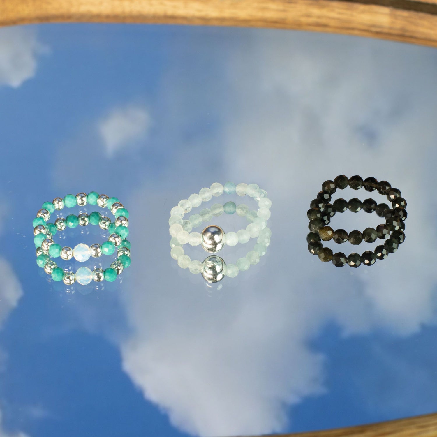 Rings collection featuring gemstone and metal designs for everyday wear and stacking