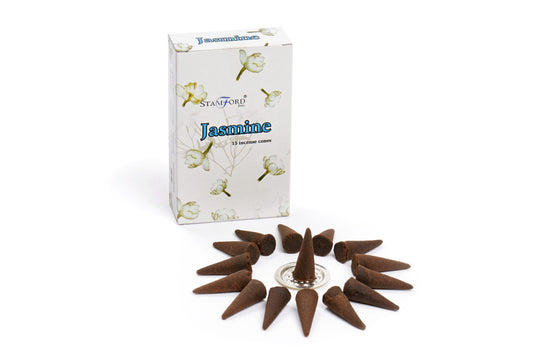 Incense cones are arranged in a circle with one on a holder. Behind them is a box labeled "Stamford Jasmine 15 incense cones," decorated with jasmine flowers.