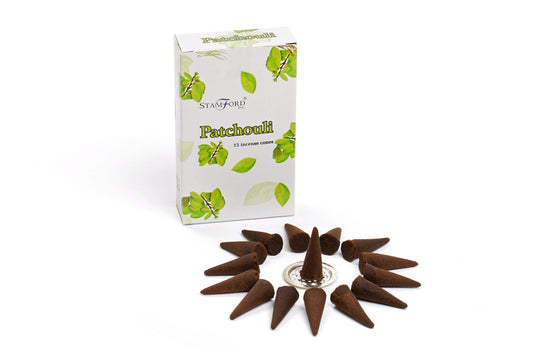 Incense cones form a circle around a holder. The box reads "STAMFORD Patchouli, 15 incense cones," and features illustrations of green leaves on a white background.