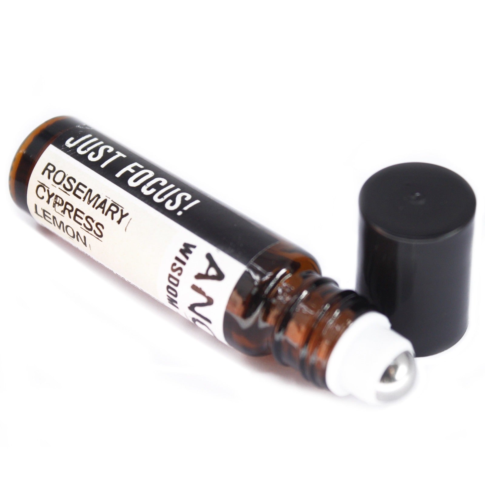 A brown essential oil rollerball with a black lid off, lies on a white surface. Text on the bottle reads, "JUST FOCUS! ROSEMARY CYPRESS LEMON AND WISDOM".