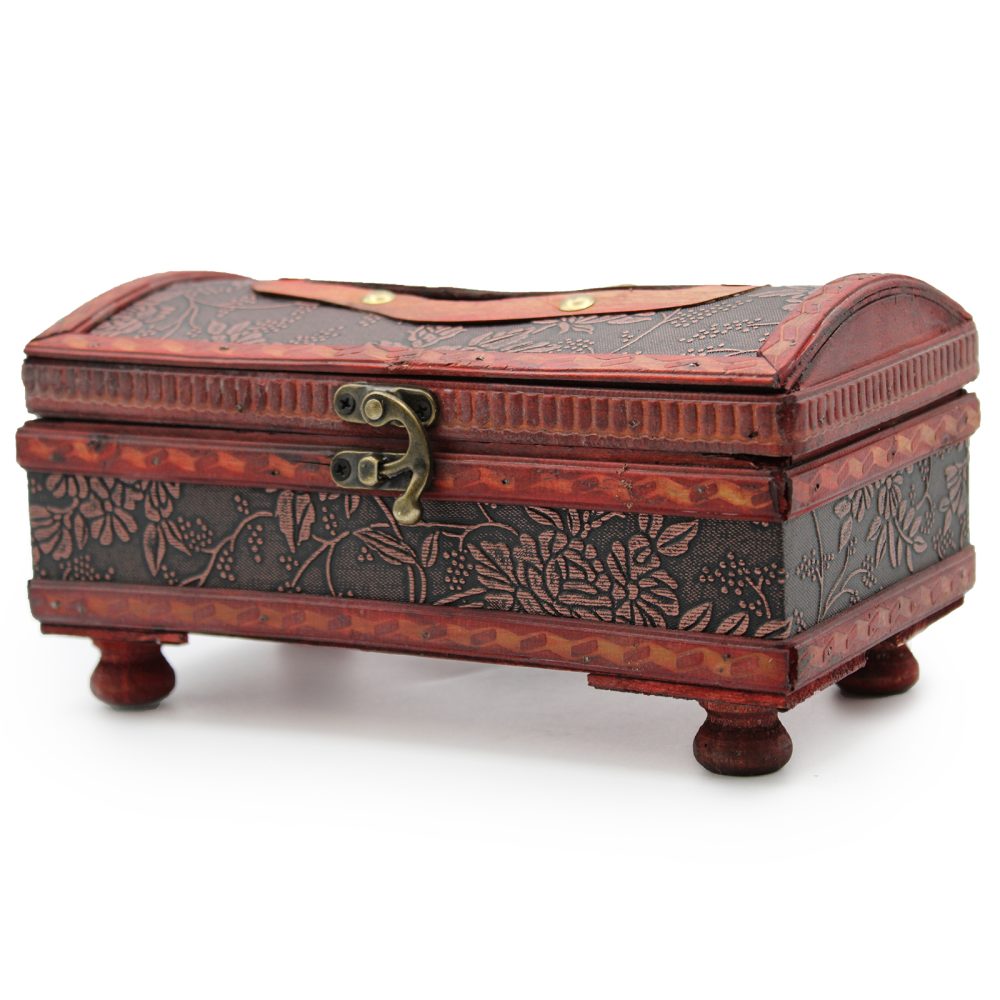 A decorative, floral-patterned wooden box with a curved lid and metal clasp sits elevated on four round feet, placed against a plain white background.