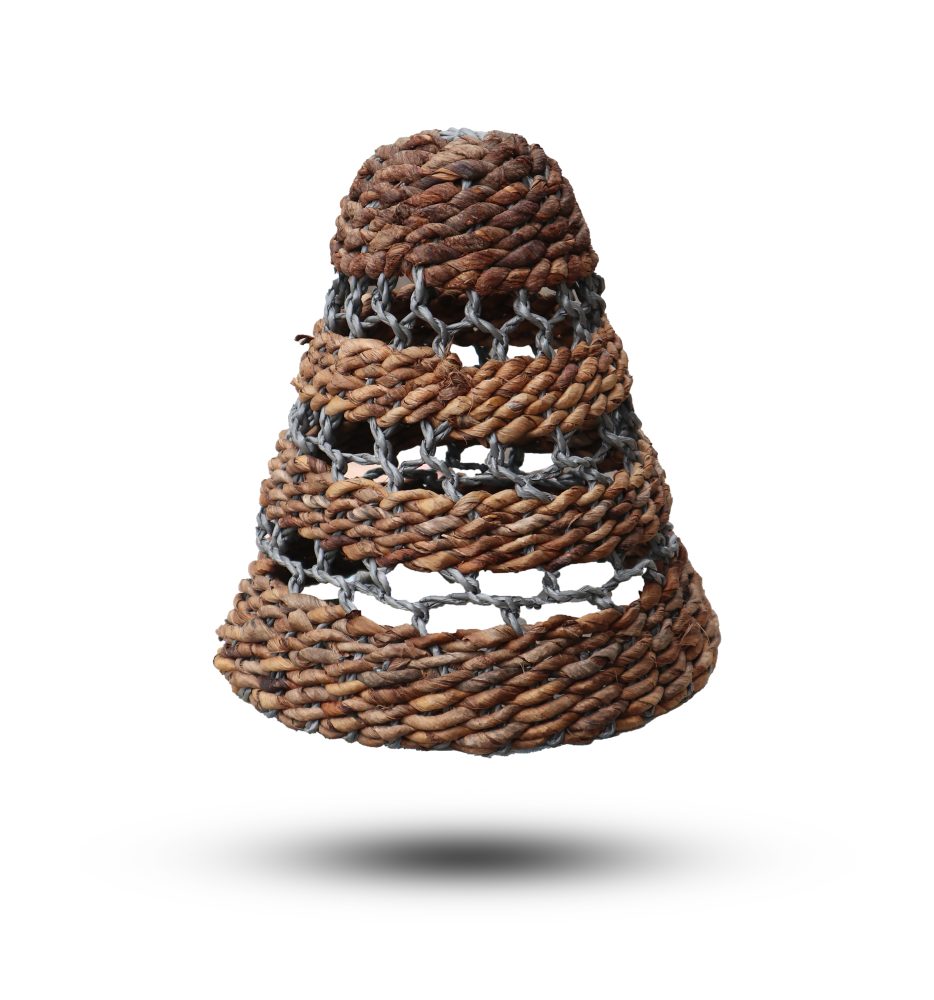 A woven, cone-shaped basket hangs against a white background.  The basket is composed of brown strands and interspersed netting.